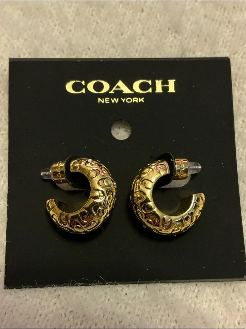 Coach Gold-Tone Hoop Earrings with Signature Engraving - Picture 4 of 4